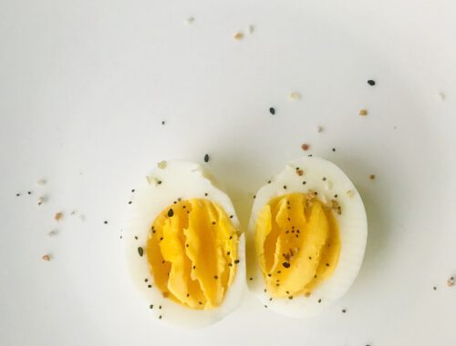 Sliced Boiled Egg on White Plate